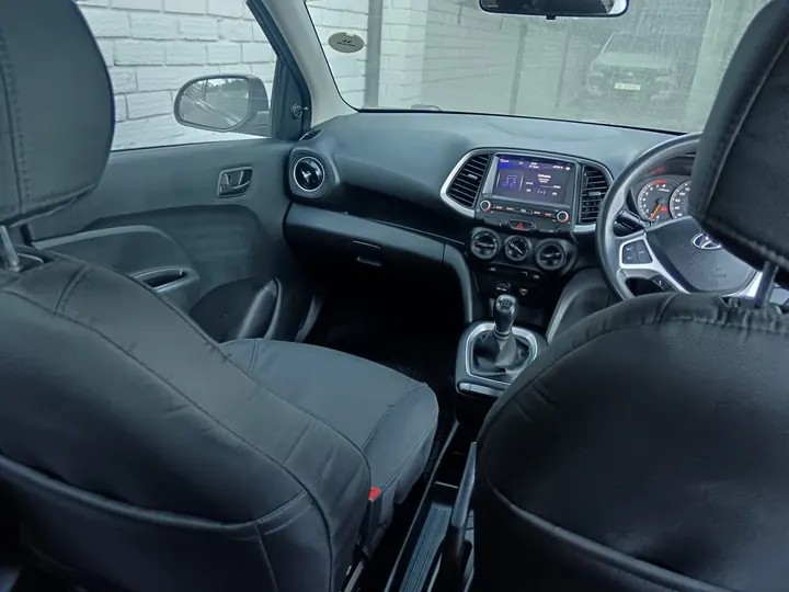 Inside a manual training car: dashboard and gear lever